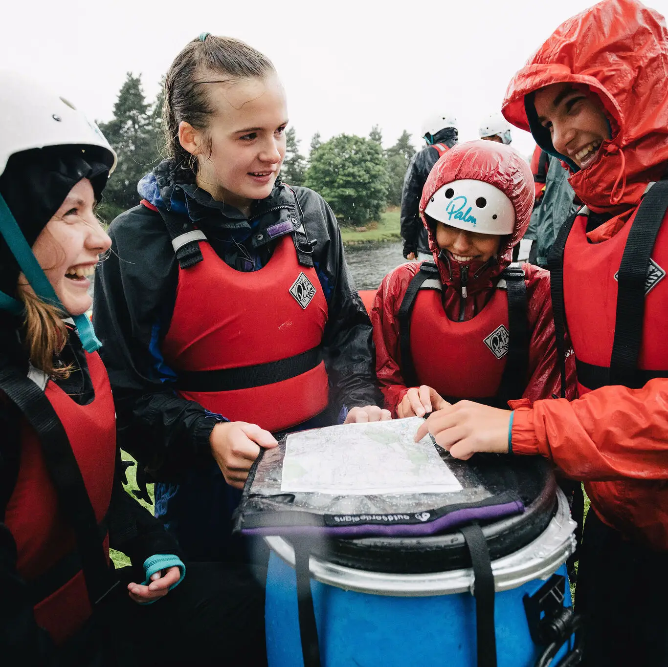 A group of young people using navigation skills on their Duke of Edinburgh award expedition