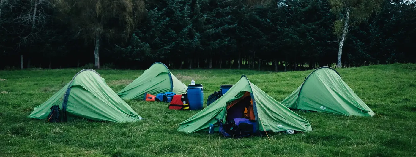 Group of young people on their Duke of Edinburgh Award Expedition Camping at night