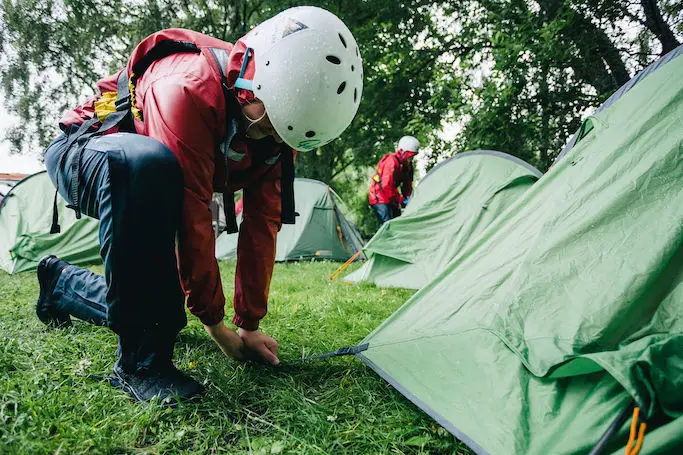 A young person pitching there tent on a duke of Edinburgh expedition